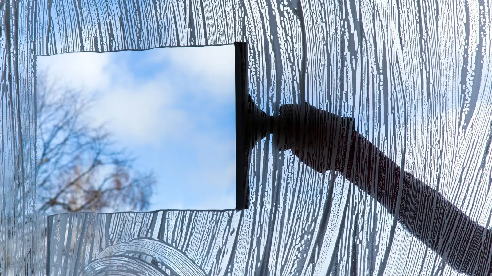 Hard water stain removal on glass in Wagner SD